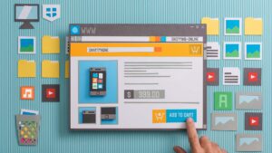 Cardboard cutouts of a mock website design ecommerce layout.