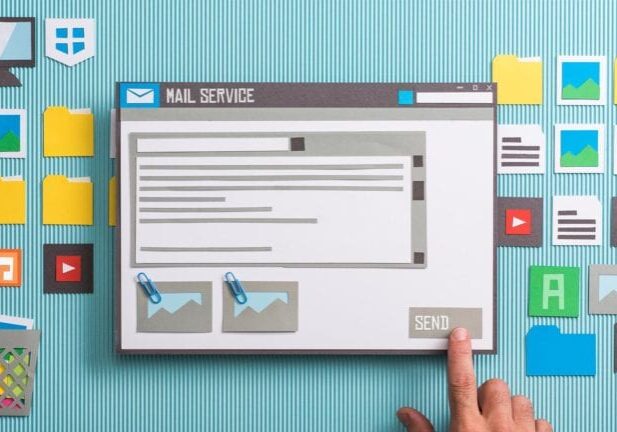 Cardboard cutout image depicting an email about to be sent